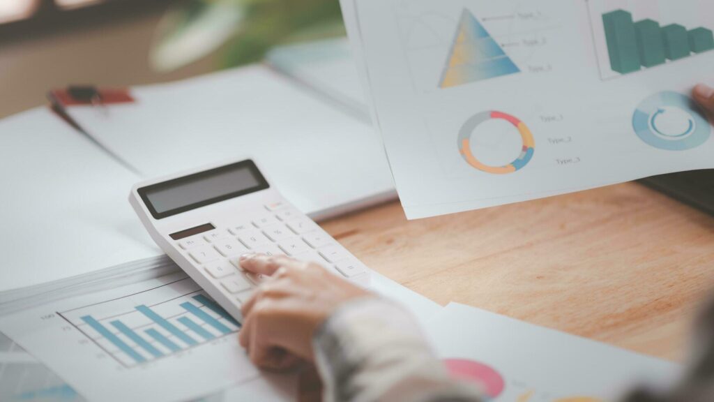 Engineer evaluating technical feasibility and production costs for CPG manufacturing success.