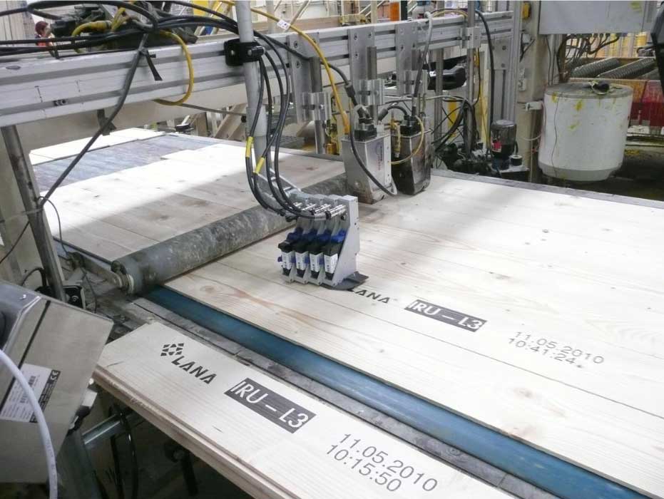 Industrial lumber marking on an automated wood production line